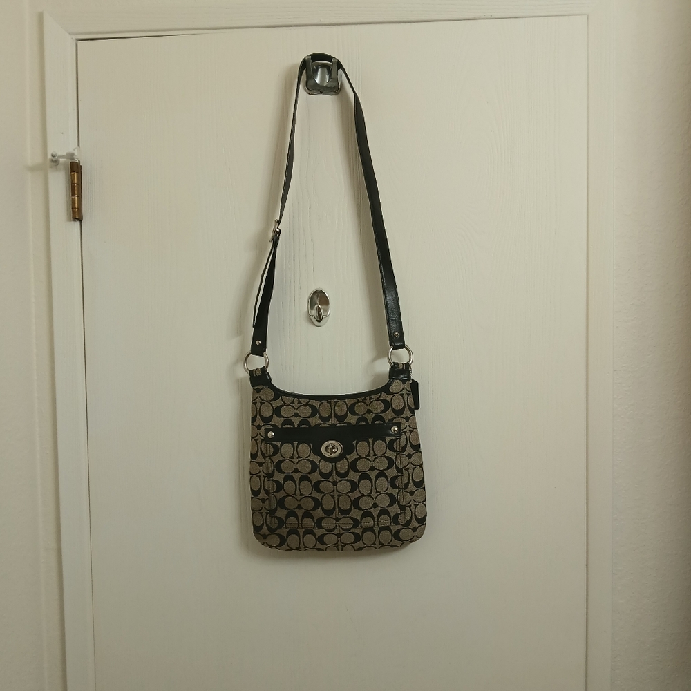 Coach Signature Penelope Hippi Bag.